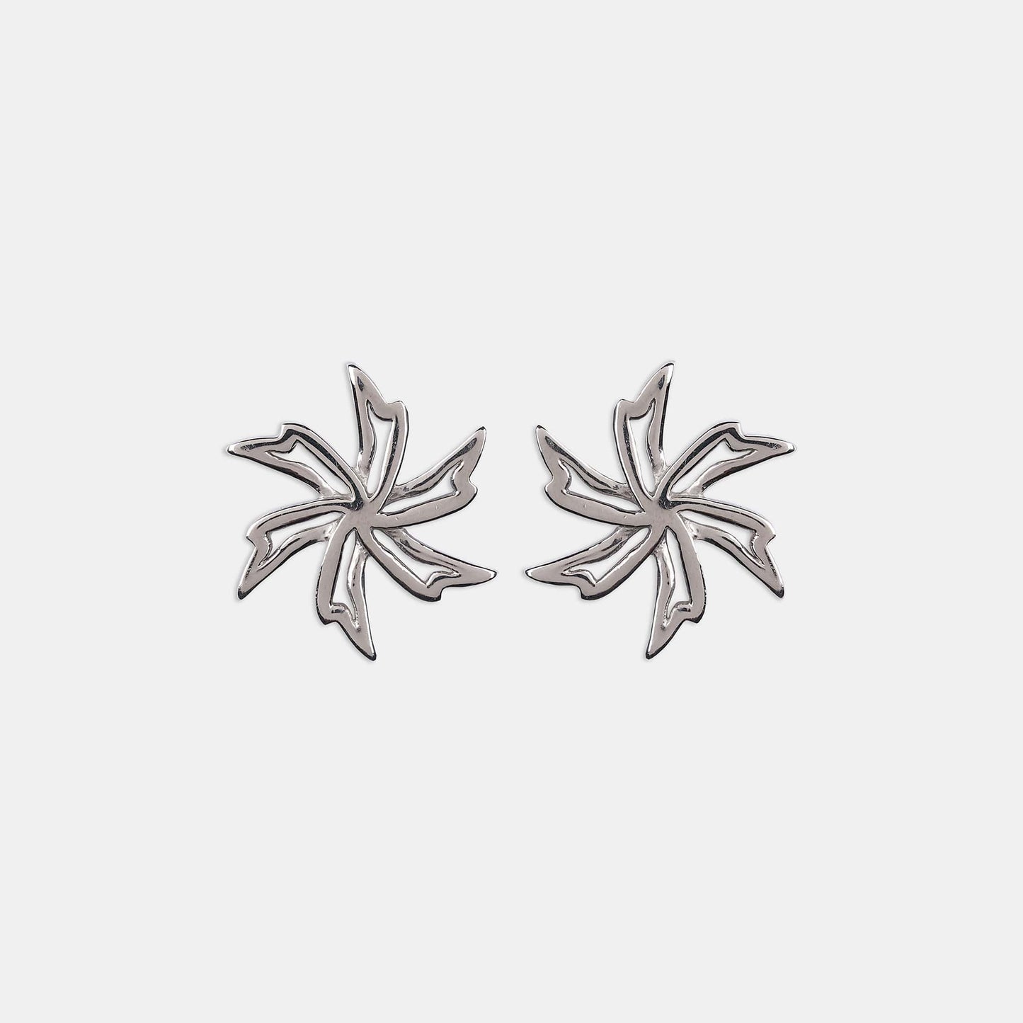Elevate your style with these elegant silver star earrings on a pristine white background, a must-have accessory