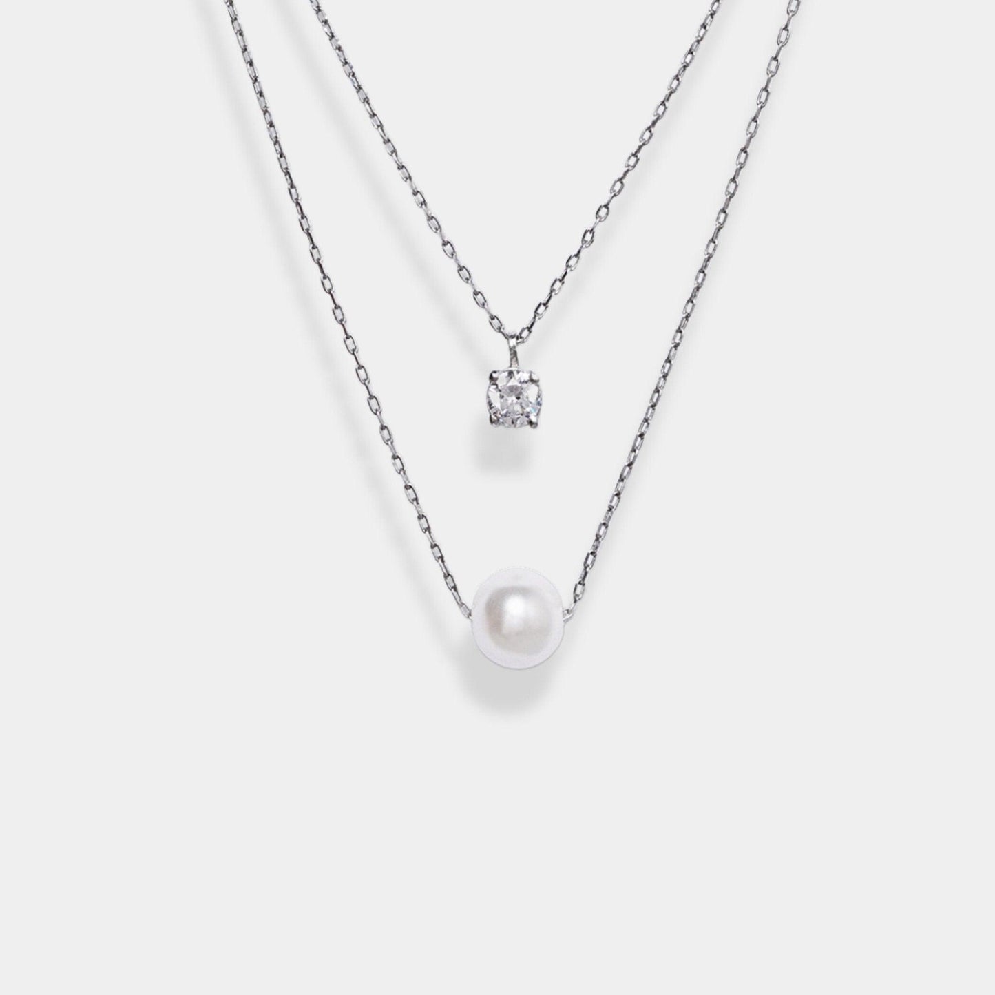 Elevate your style with our exquisite sterling silver necklace featuring a captivating circle pendant on a beautifully layered delicate chain