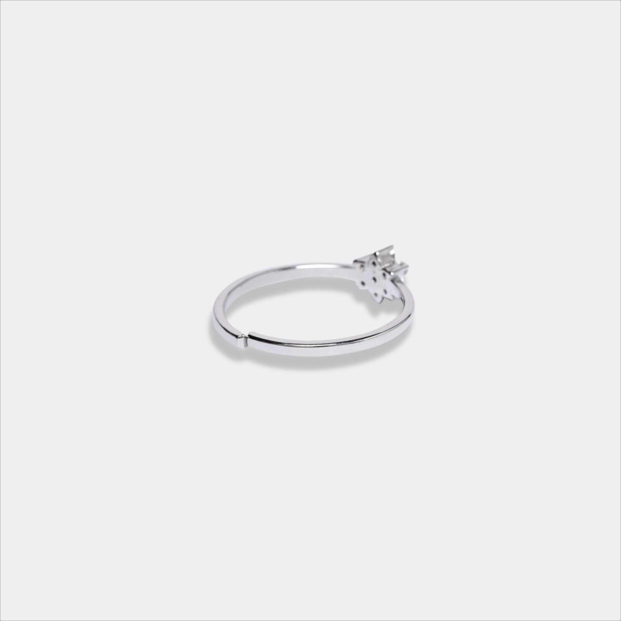 Elegant sterling silver ring featuring a diamond and star design