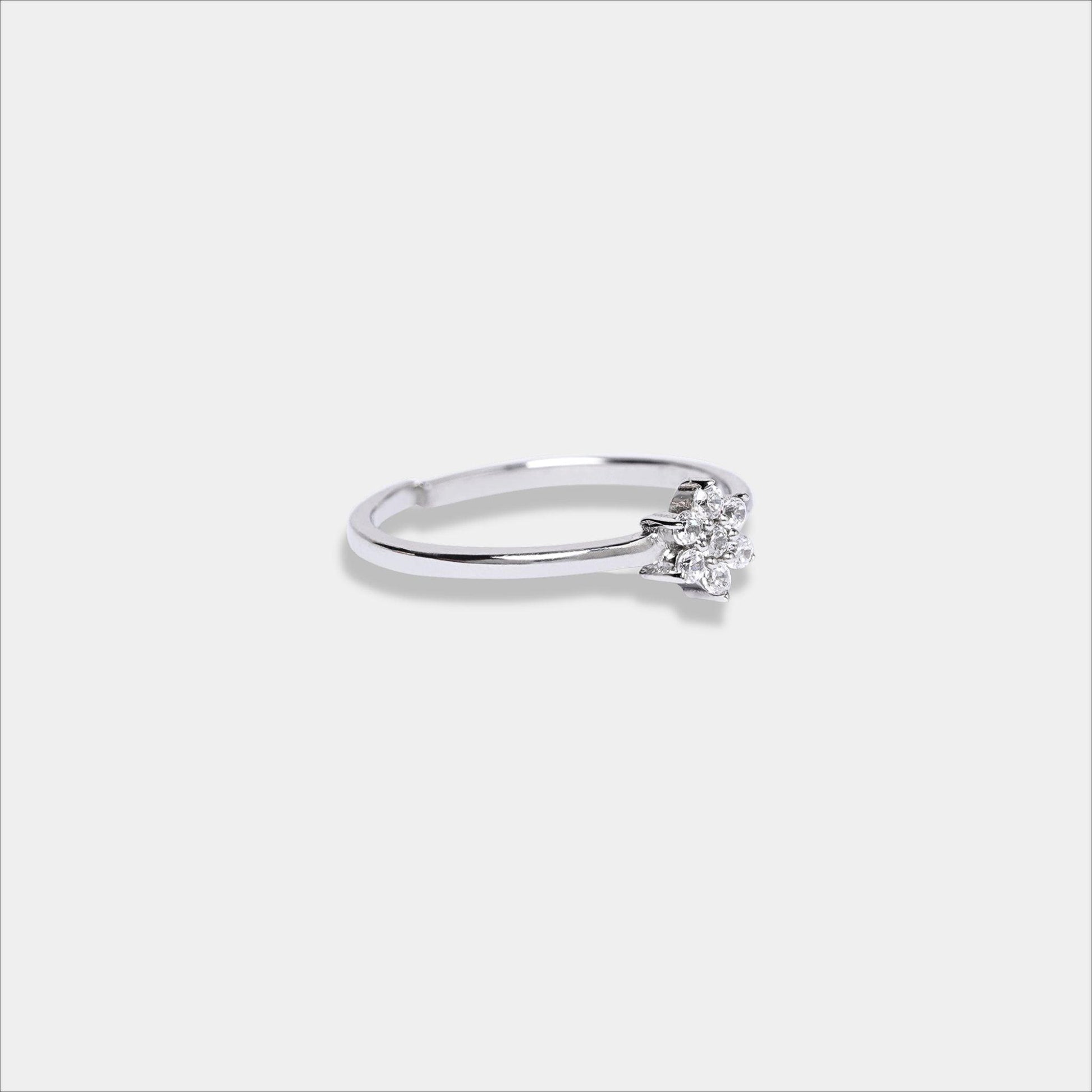 Elegant sterling silver ring featuring a diamond and star design