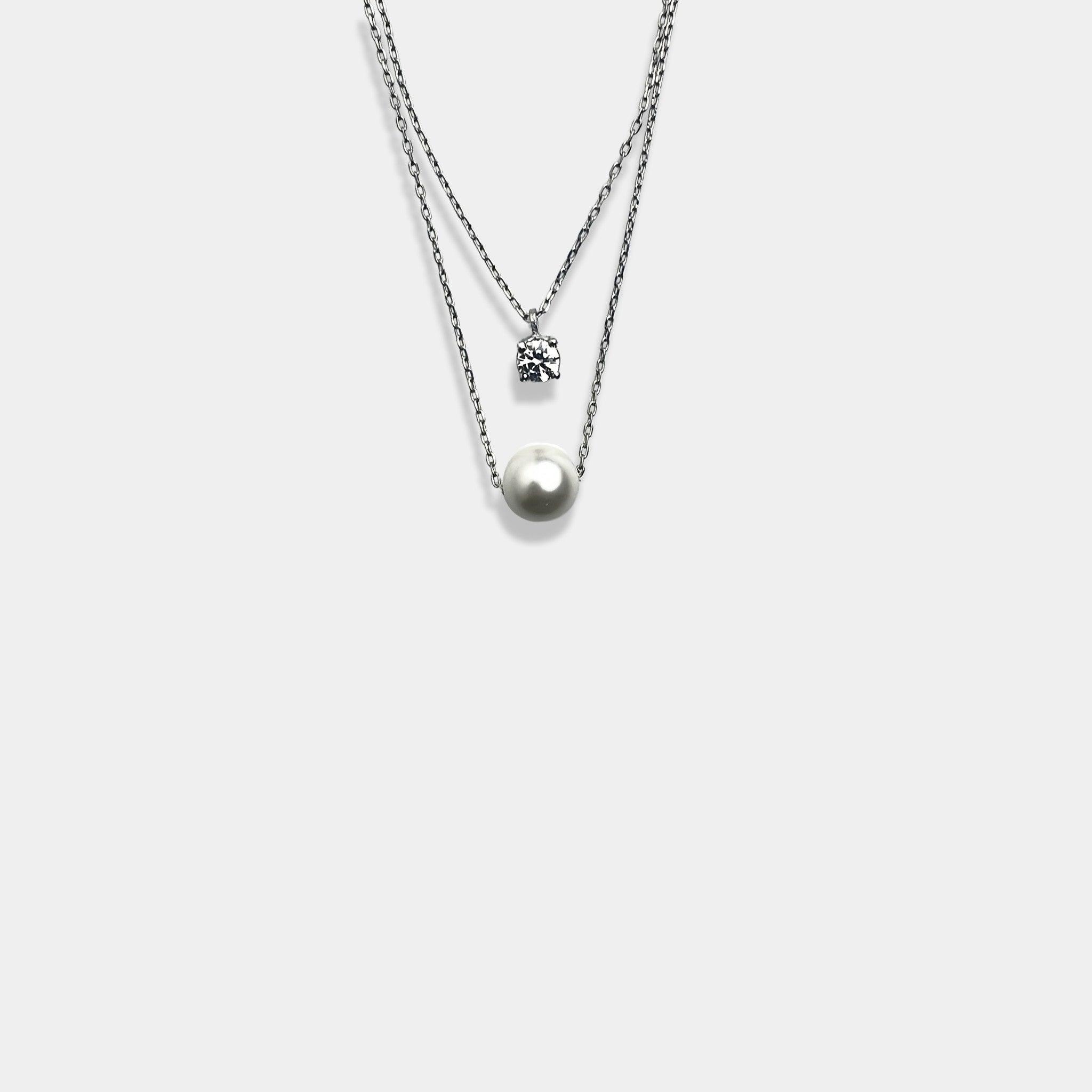 Elevate your style with our exquisite sterling silver necklace featuring a captivating circle pendant on a beautifully layered delicate chain.