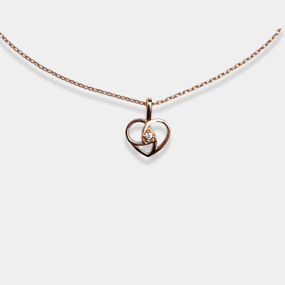 Fall in love with our stunning rose gold Love's Embrace Necklace, a timeless expression of affection
