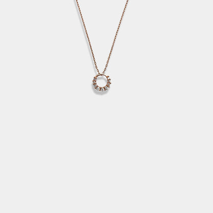  Elevate your look with our captivating sterling silver necklace, showcasing a graceful circle pendant on a dainty chain.