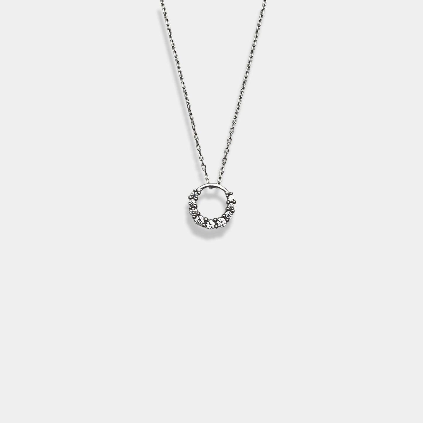 Discover elegance at its finest with our sterling silver necklace, adorned with a circle pendant that adds a touch of grace to any outfit.
