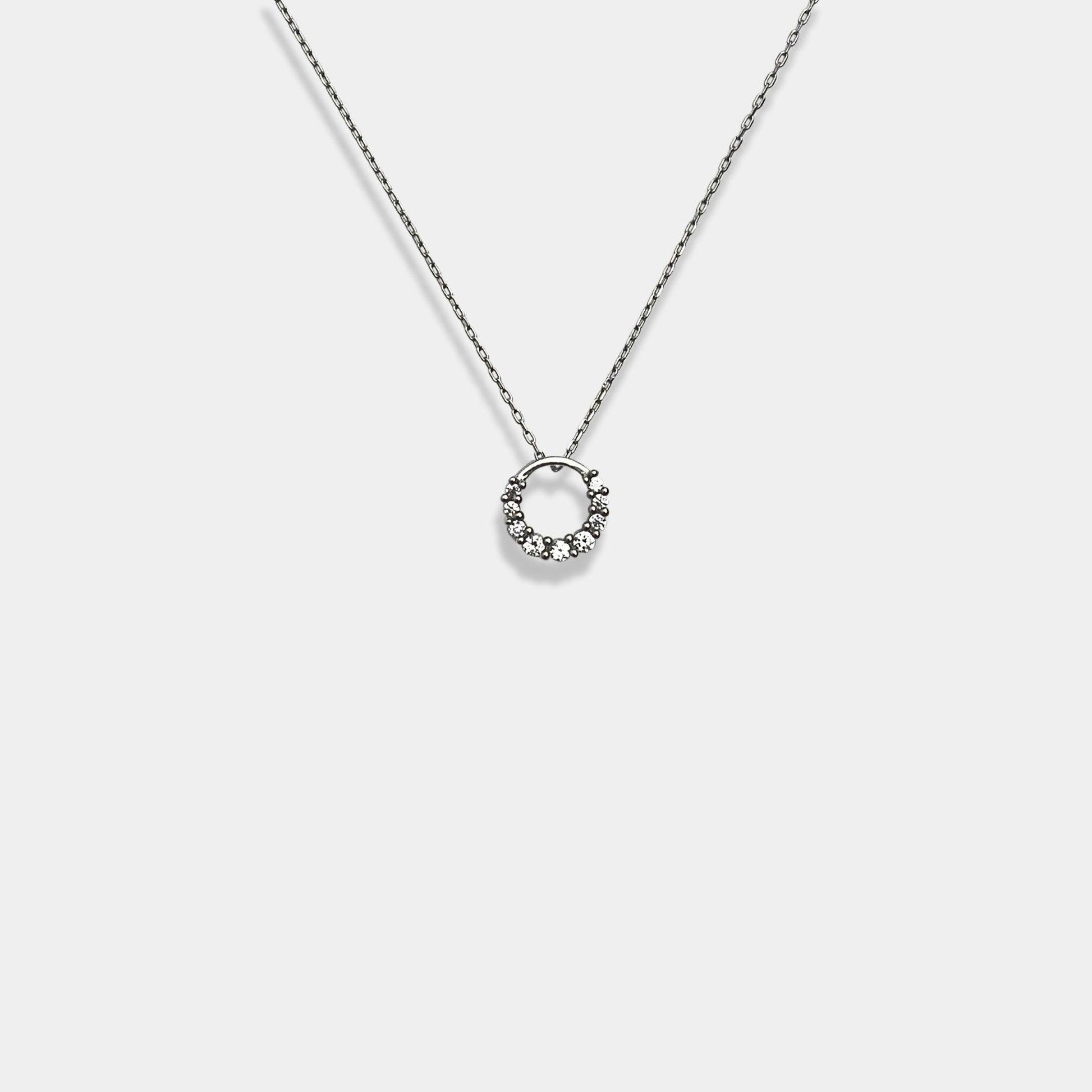 Discover elegance at its finest with our sterling silver necklace, adorned with a circle pendant that adds a touch of grace to any outfit.