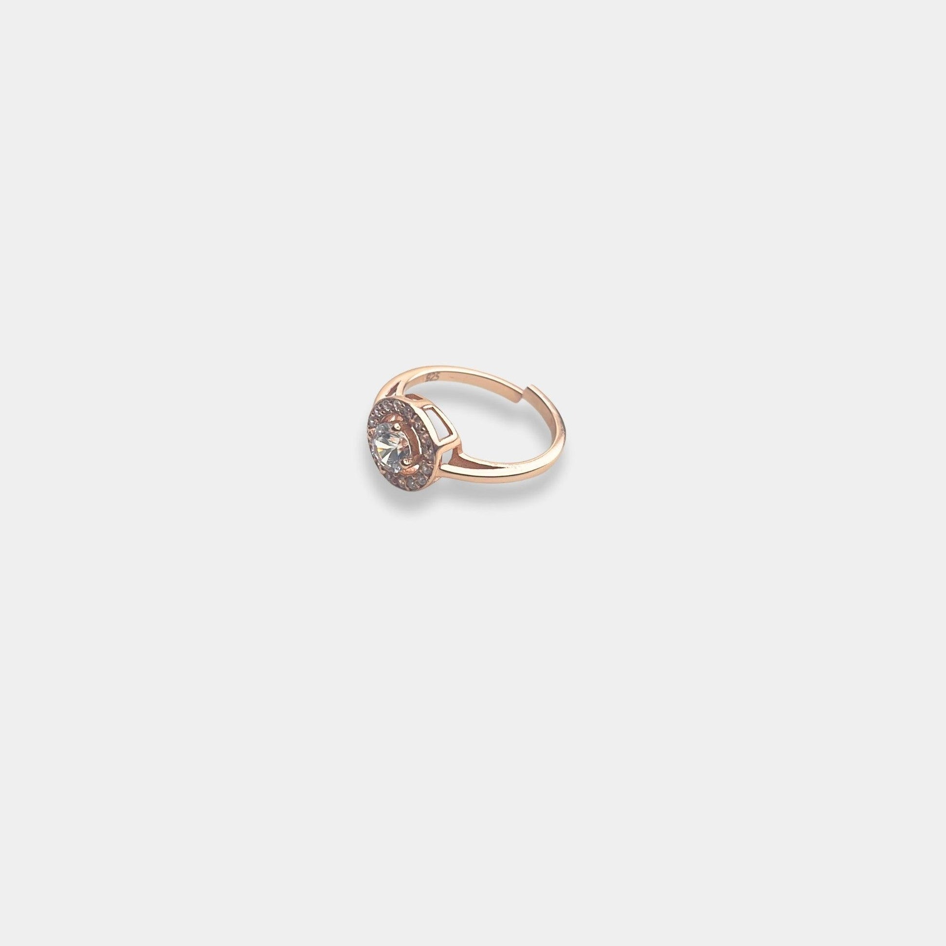 Discover the allure of a sterling silver ring, shining brightly against a pristine white background, exuding eternal elegance.