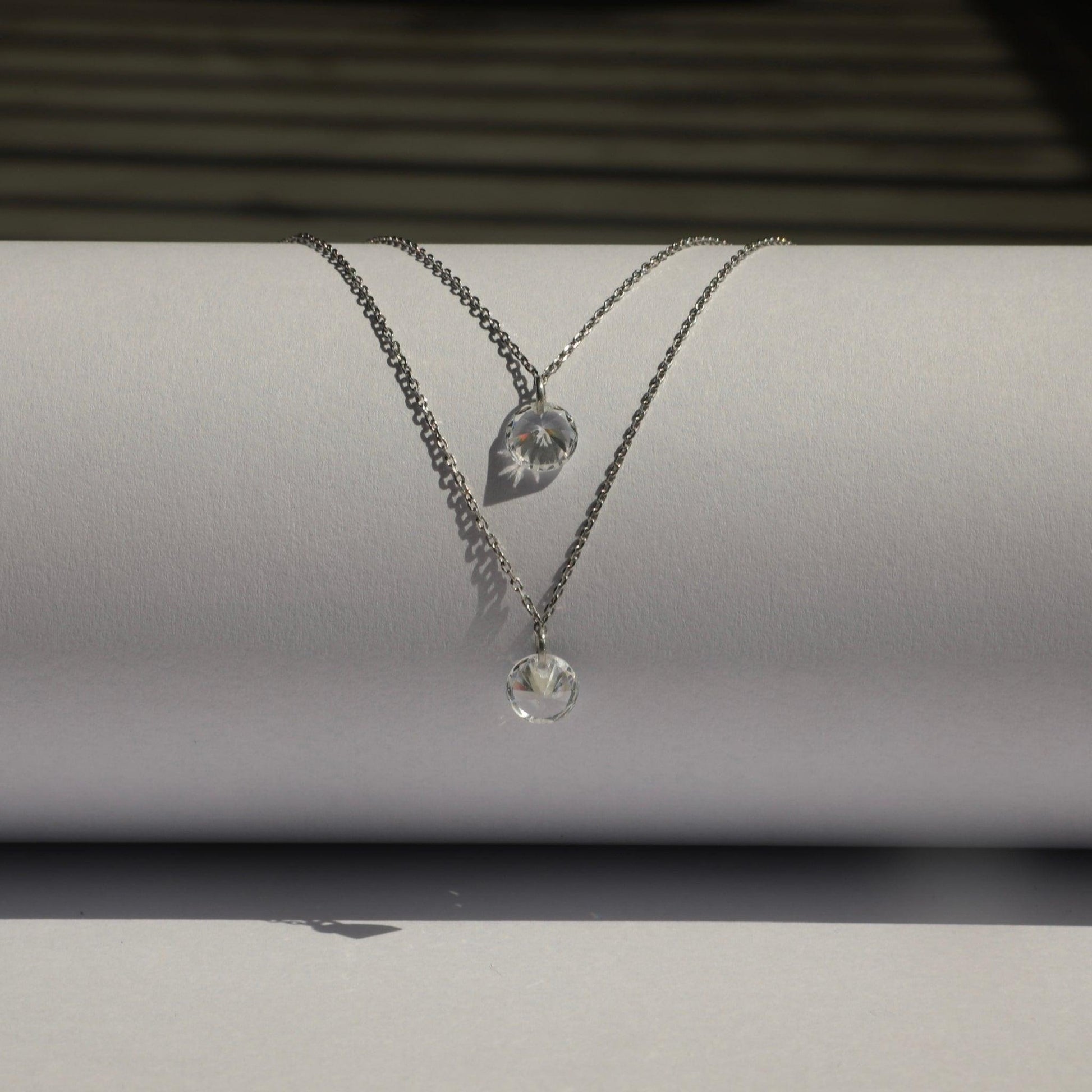 Elegant sterling silver necklace adorned with sparkling AAA cubic zirconia for a touch of timeless glamour