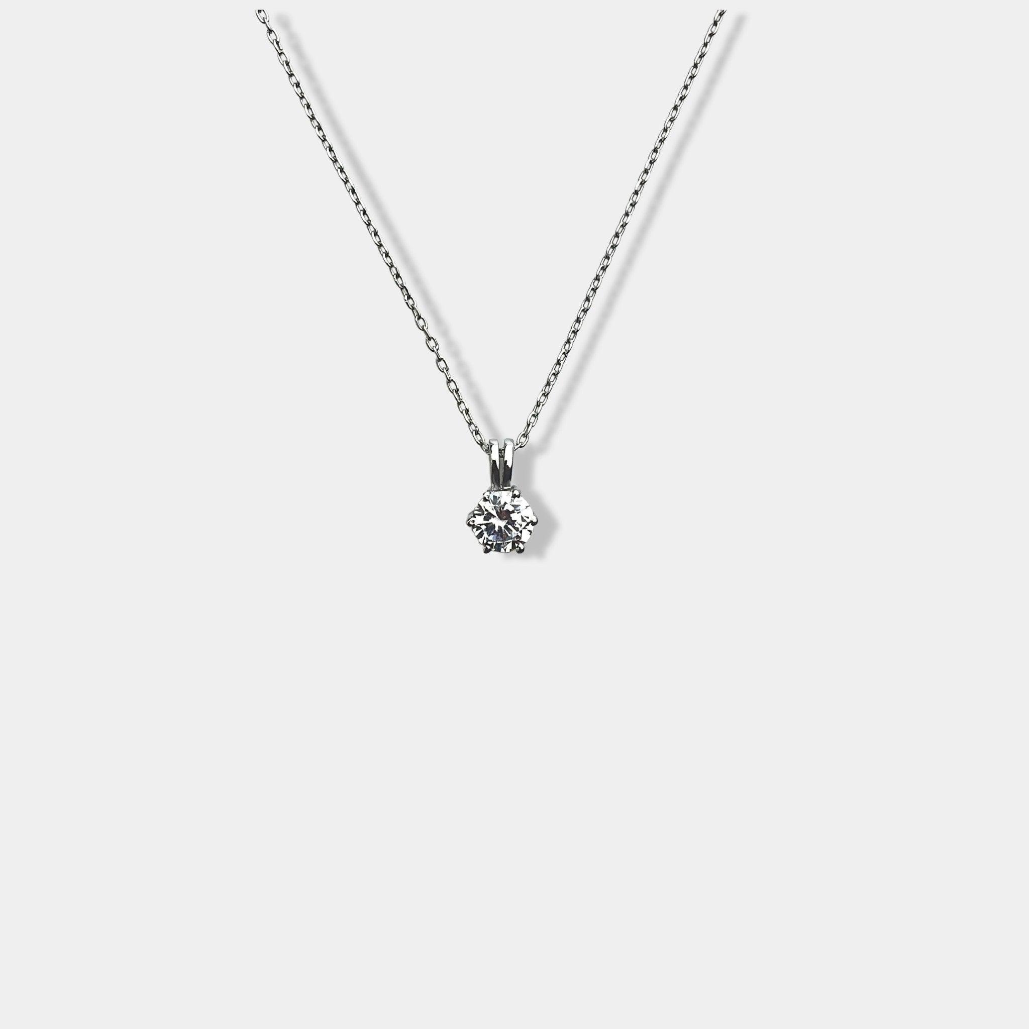 Enhance your style with a dazzling pendant on a chic sterling silver necklace. 2. Elevate your fashion game with a stunning pendant and a stylish sterling silver necklace. 3. Add a touch of elegance to your outfit with a shimmering pendant on a sleek sterling silver necklace.