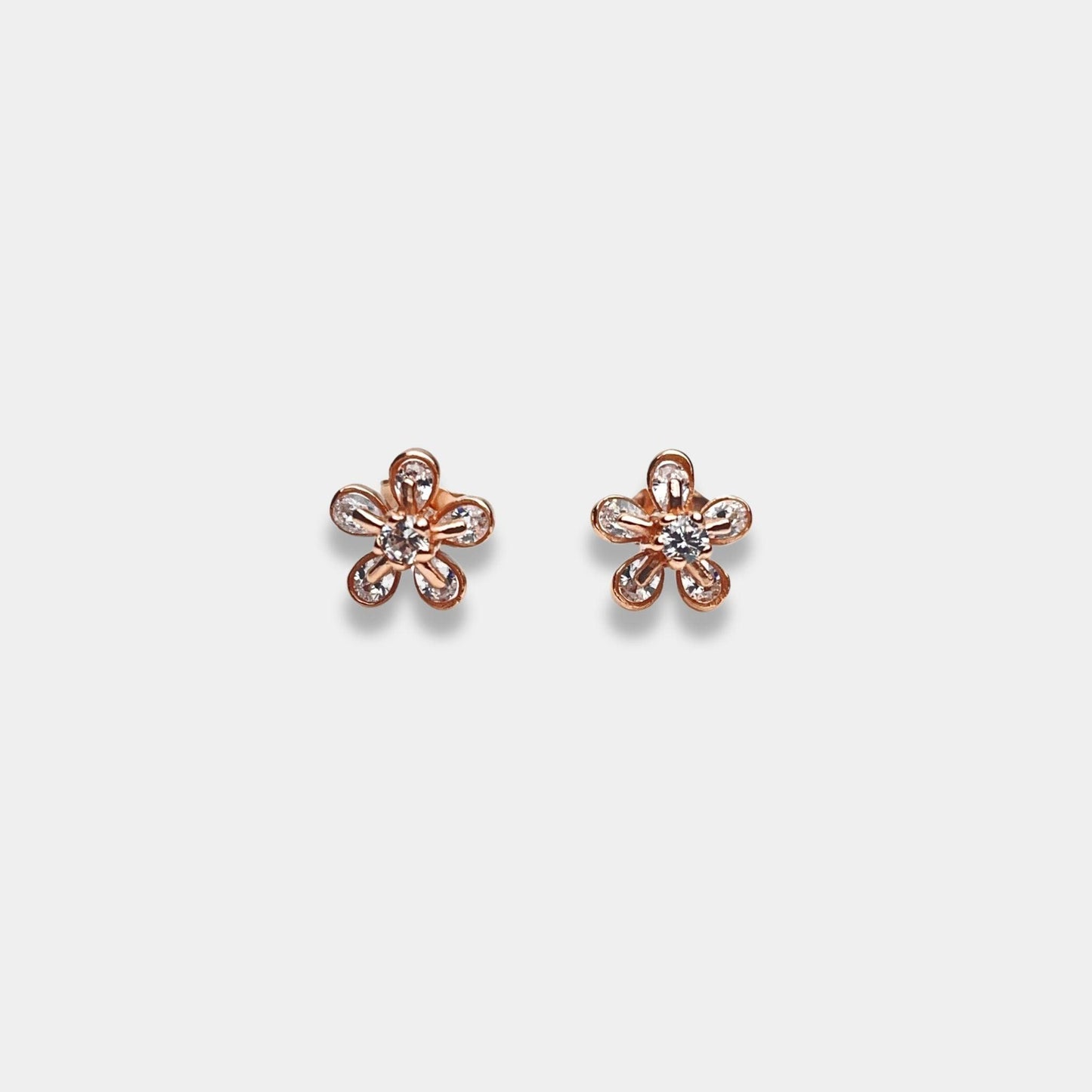 Rose gold flower stud earrings on sterling silver base