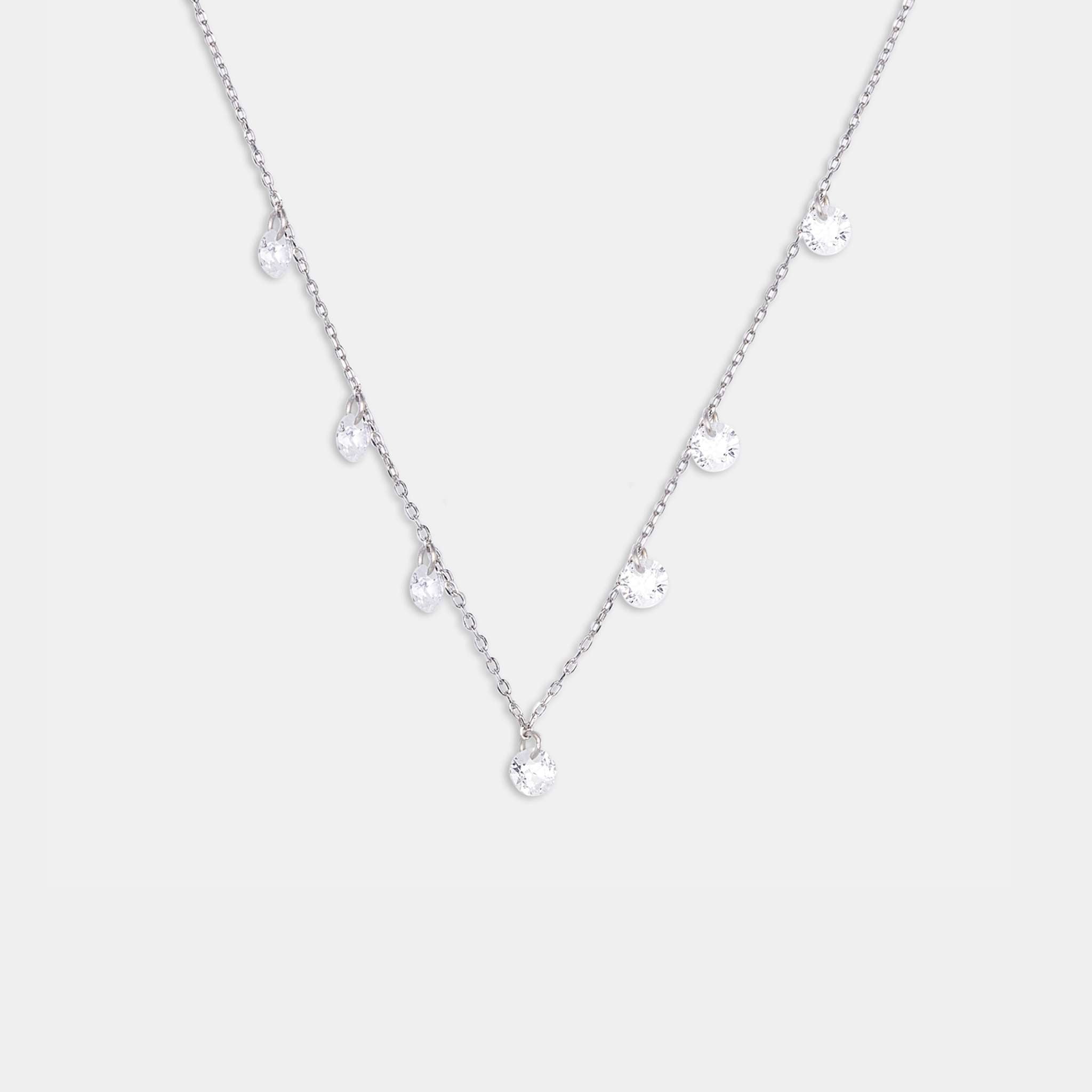 A dazzling sterling silver necklace adorned with delicate white stones, adding a touch of elegance to any outfit.